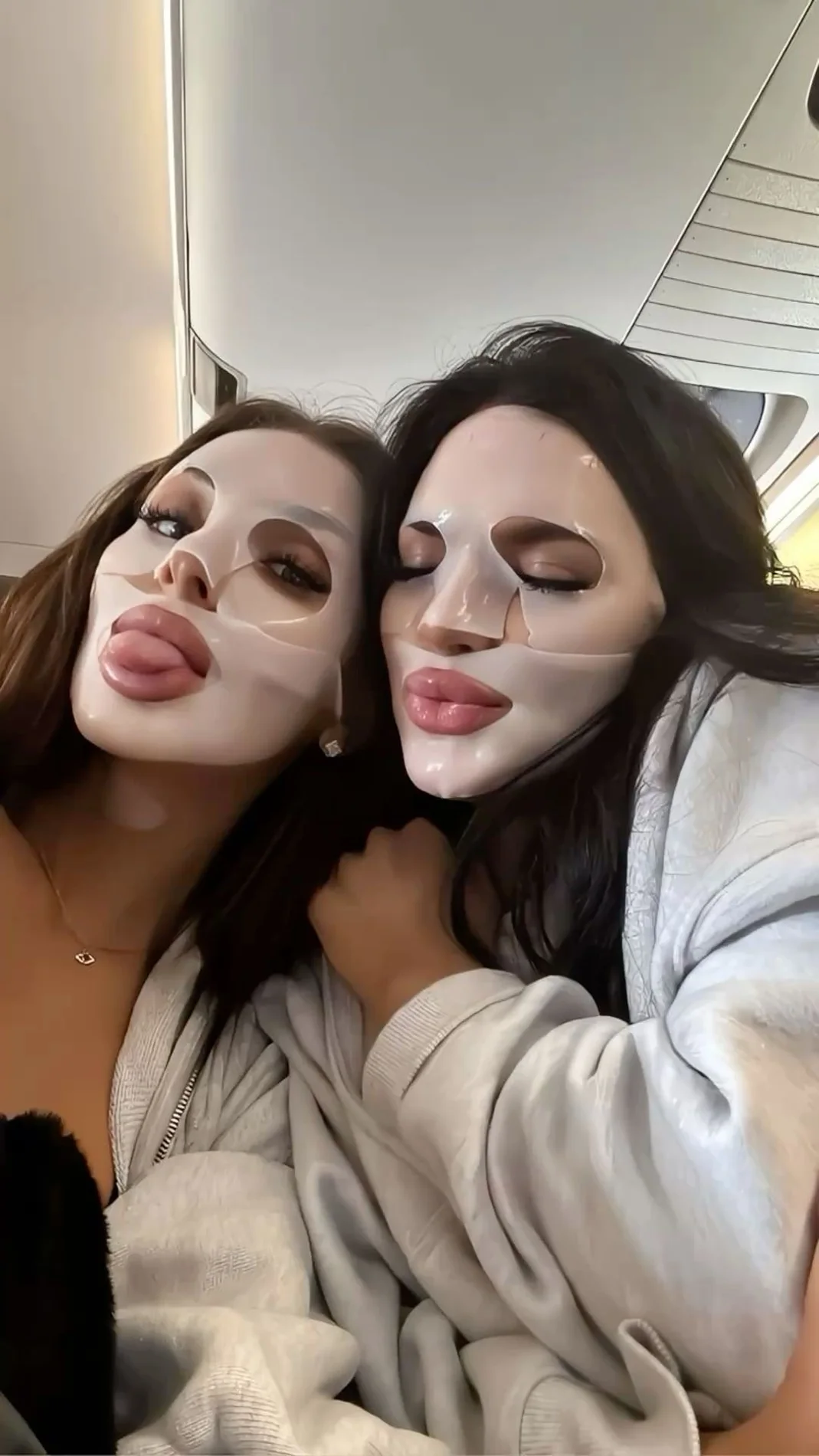 Friends wearing face masks together on a flight
